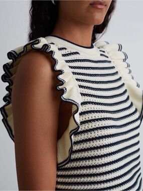 Striped Ruffle Knit Sleeveless Top in Cream and black.